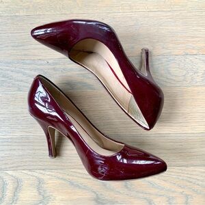 Burgundy red patent leather pumps